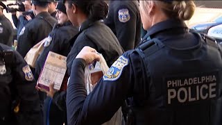 Philly police deliver food donations to Philabundance