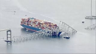 Helicopter video shows cleanup work around wrecked Baltimore bridge