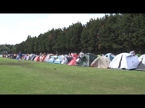 Tennis Fans Queue For Opening Day At Wimbledon