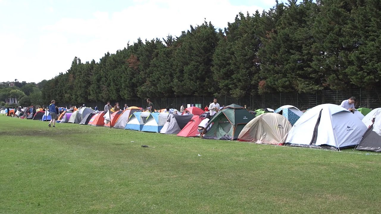 Tennis Fans Queue For Opening Day At Wimbledon