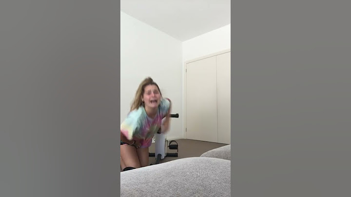 girl falls off exercise bike