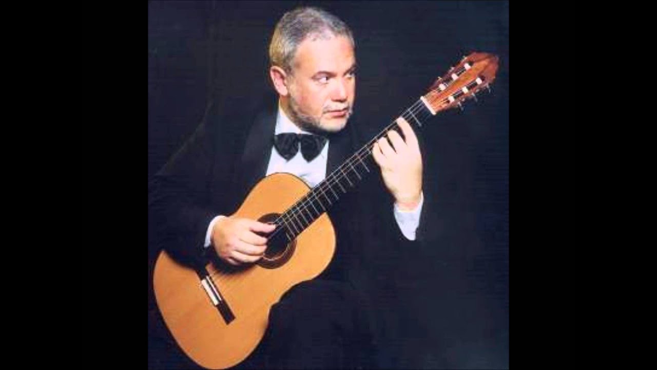 Raro.Eduardo Isaac interpreta la Suite Argentina,de Eduardo Falú..wmv