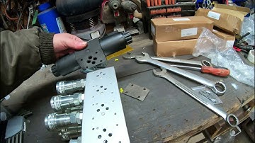 Mahindra max  gets the summit hydraulics 4 valve remotes with the johndeere 3rd function kit