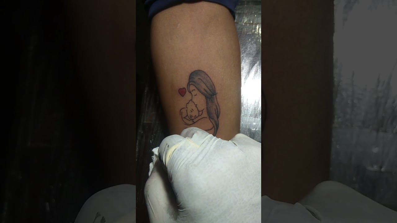 mom and baby tattoo done by me.. 