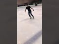 Slow motion hockey stop on ice