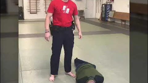 Handcuff prone suspect without using baton