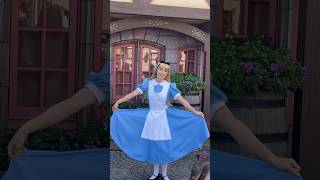 Alice Greeting Guests At Tokyo Disneyland