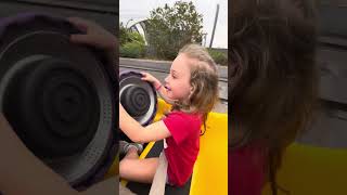 Melaina driving go cart at Disney march 2025