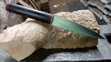 Forging a knife from a coil spring