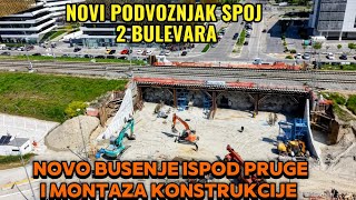 NASTAVAK BUSENJA PODVOZNJAKA SPOJ 2 BULEVARA,MONTAZA NOSECE KONSTRUKCIJE ISPOD PRUGE I BETONA ULAZA