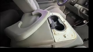 How to Replace the Center Console Cupholder Armrest Pad on a Ford F250 / F350.