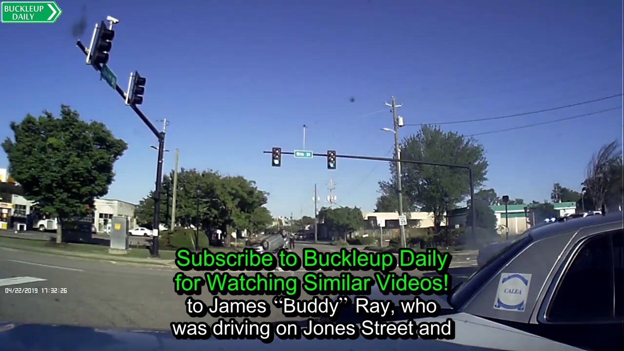 Police officer runs a red light and crashing into and flipping a PT ...