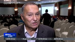 Experts gather to discuss country's development plans Profile