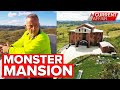Monster mansion sits unfinished over elevator feud | A Current Affair