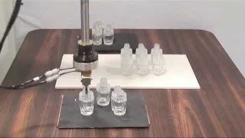 Adept Cobra SCARA Handling Two-Pack Small Glass Bottles