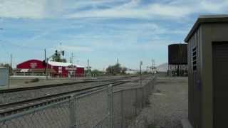 Railfanning the Union Pacific Gila Sub:  EB Stack Train Passes Maricopa, AZ Amtrak Station 7-31-2013