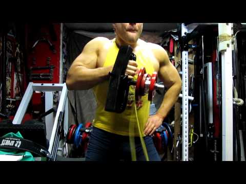 Michael Gundill performs hammer curls