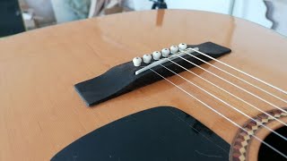 Acoustic guitar bridge repair