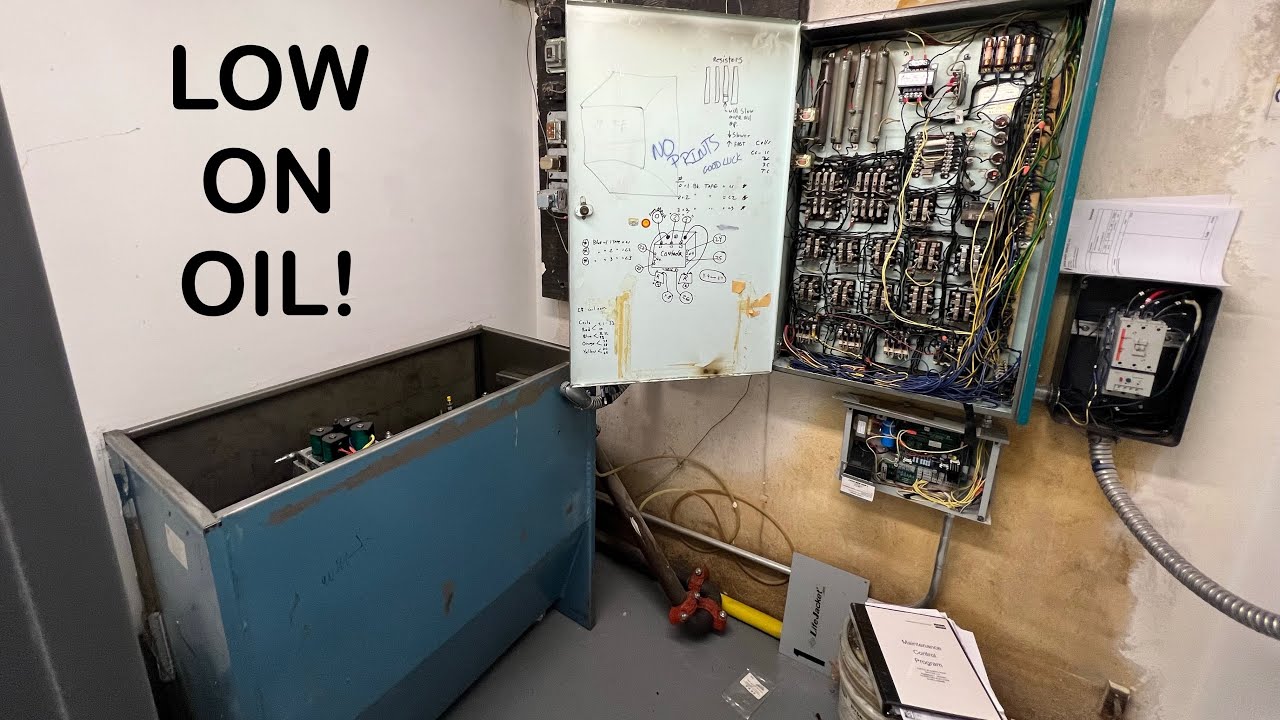 Haughton Elevator in Denver that is SEVERELY low on hydraulic fluid with machine view oil splashing