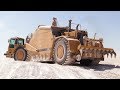 Big Twin Engine Cat 657E Scraper Working In A Lime Quarry