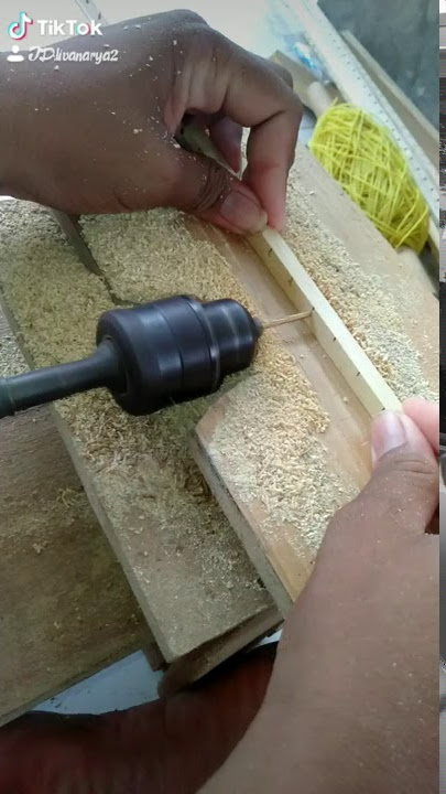 Membuat lubang jeruji sangkar agar jarak sama