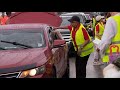 Urban League drive-thru tornado relief event serves hundreds of families