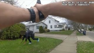 Cop jumps out of car and shoots teen holding a fake gun