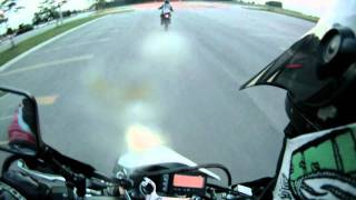 Drz400sm chasing another drz supermoto almost crashing
