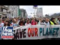 Tucker Takes On Democratic Socialist Over Climate Change
