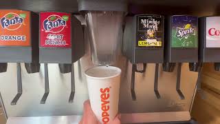 A view of Popeyes Louisiana Kitchen Brief History & then getting Coca-Cola from the soda fountain