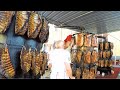 400 Kg of Pork Meat Roasted on Huge Multilevel Stoves. Italy Street Food Event