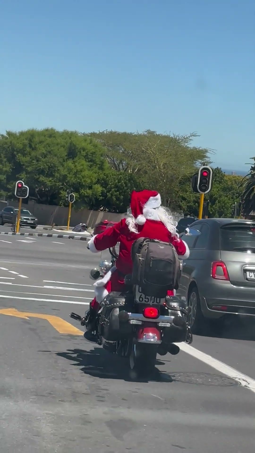 Santa Rides a Motorcycle Through Cape Town || ViralHog