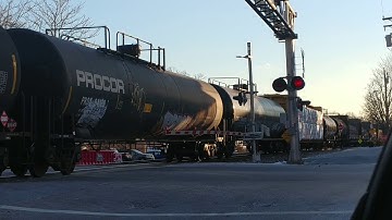 Mixed manifest Northbound on track one with a CSX SpongeBob square Cab in the lead