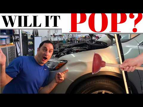 Huge Nissan Dent- Paintless Dent Repair in Merritt Island, Cocoa, Melbourne, Viera, Titusville Huge Nissan Dent- Paintless Dent Repair in Merritt Island, Cocoa, Melbourne, Viera, Titusville