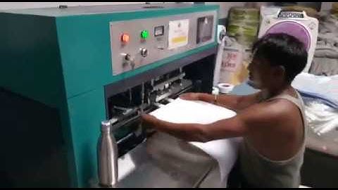 WOVEN HANDLE LOOP MAKING SEALING MACHINE