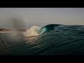 SURFING A BEACH BREAK RIP CURRENT (RAW POV)