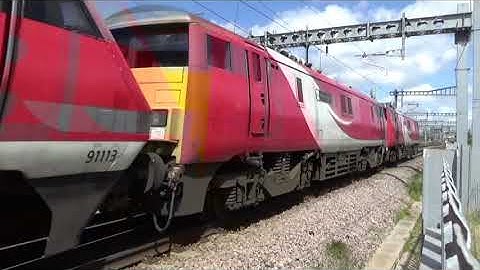 Class 57 passes through Swindon with scrap Class 91