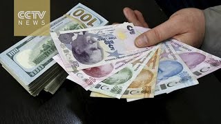 Turkish citizens rush to exchange US dollars for Lira