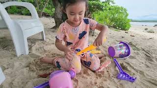 XIA AND YAZI | THEIR ADVENTURE AND PLAYTIME AT THE BEACH | PLAYING TOYS AND BUILDING SANDCASTLE