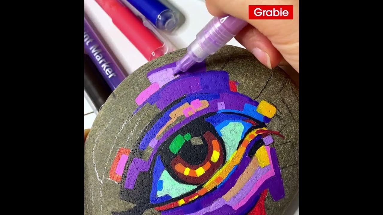 Paint a creative eye with acrylic marker pens 