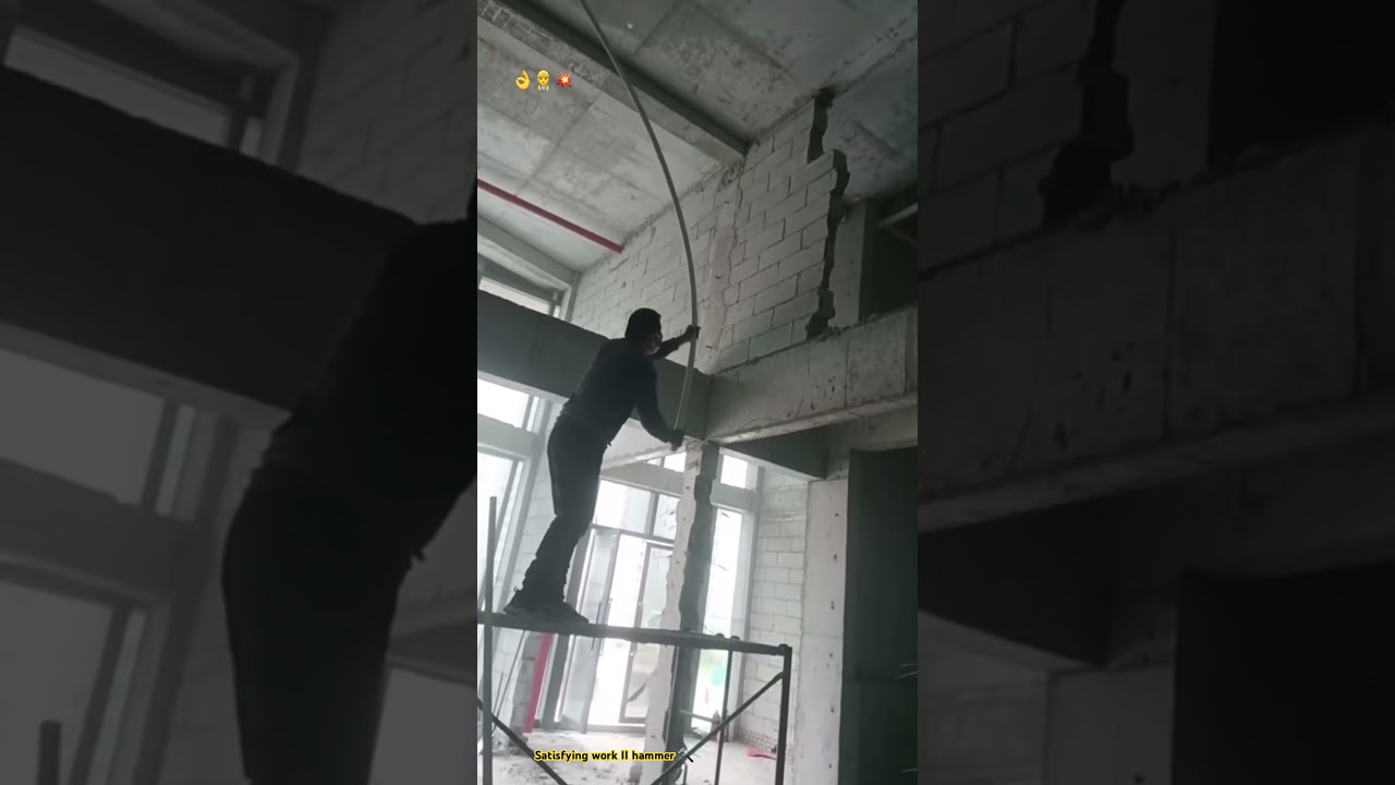 Homemade long handle hammer breaking concrete wall : Convenience tool