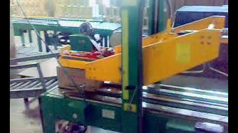 SIGNODE MAKE WEIGHING WITH AUTOMATIC FLAP CLOSING TAPING MACHINE