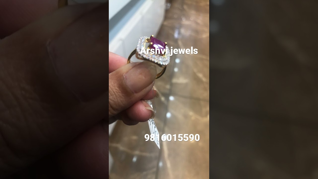 Gold ring with ruby and zircon 