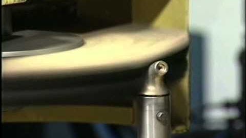 CNC rotary table machine for  buffing of sanitary fittings.