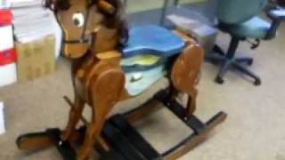 rocking horse.... handmade Hand painted. I have made 6 of these and a german shephard. All cut from pine 2x12. Shaped and 
