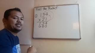 Multiplying 2-digit multiplier using standard algorithm and place value chart