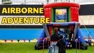 Soar To New Heights With The Airborne Adventure The Ultimate Parachute Inflatable Ride