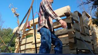 Lifting logs on Log Cabin with  Gin Pole