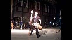 Dancers performing a ballroom number.