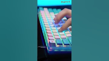 Experience the magic of vibrant lights and crisp clicks with #KB877L keyboard close-up.